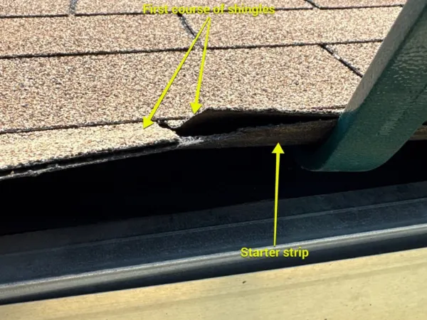 Roof inspection photo measuring lifted and worn asphalt shingles