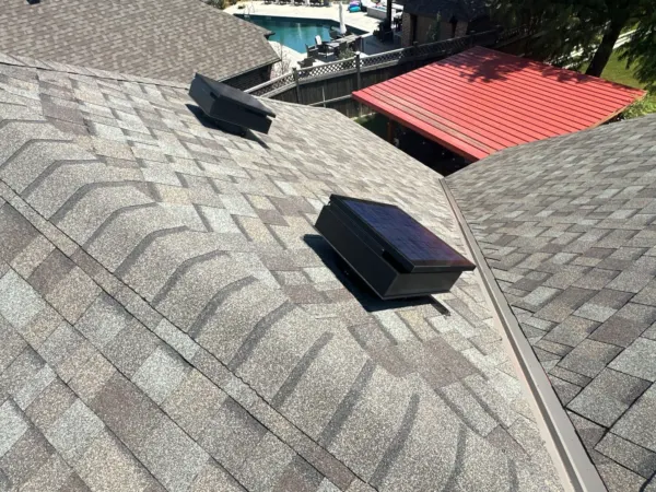 Box vents on the new Driftwood shingle roof