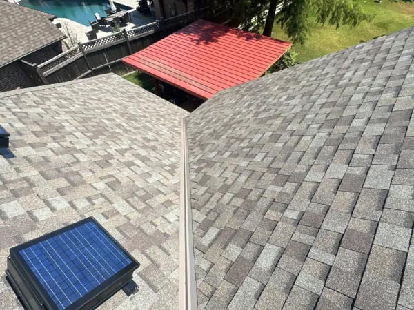 Solar attic fan on the new residential roof