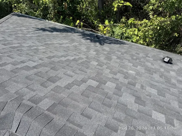 Clean finished roof plane with new architectural shingles