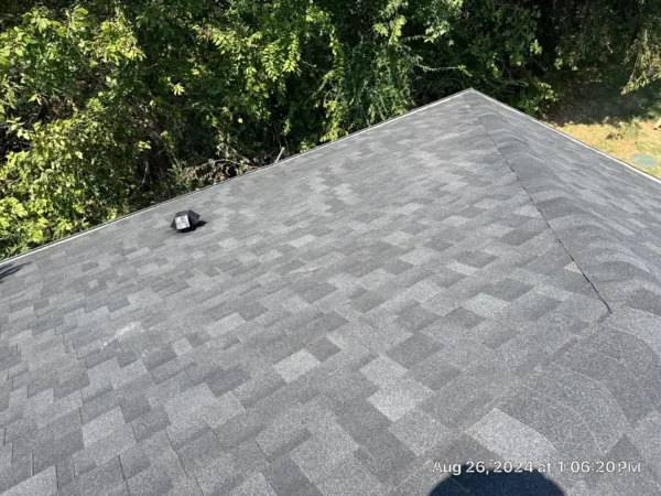 Finished roof ridge and shingle lines on the ranch home