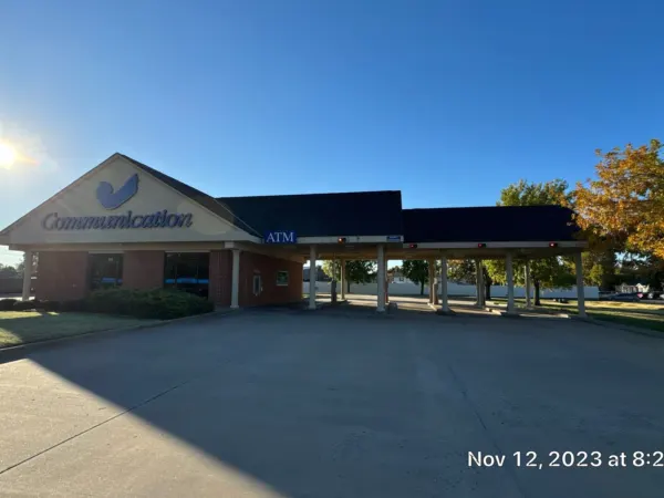 Commercial building and parking lot after the roof replacement
