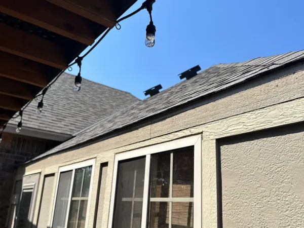 Patio roof section finished with new shingles
