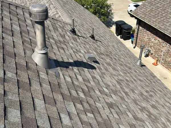 Finished roof with pipe vent flashing
