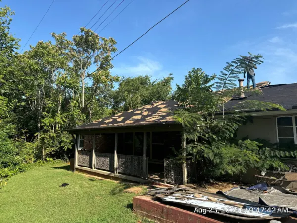 Carport section of the roof during shingle removal
